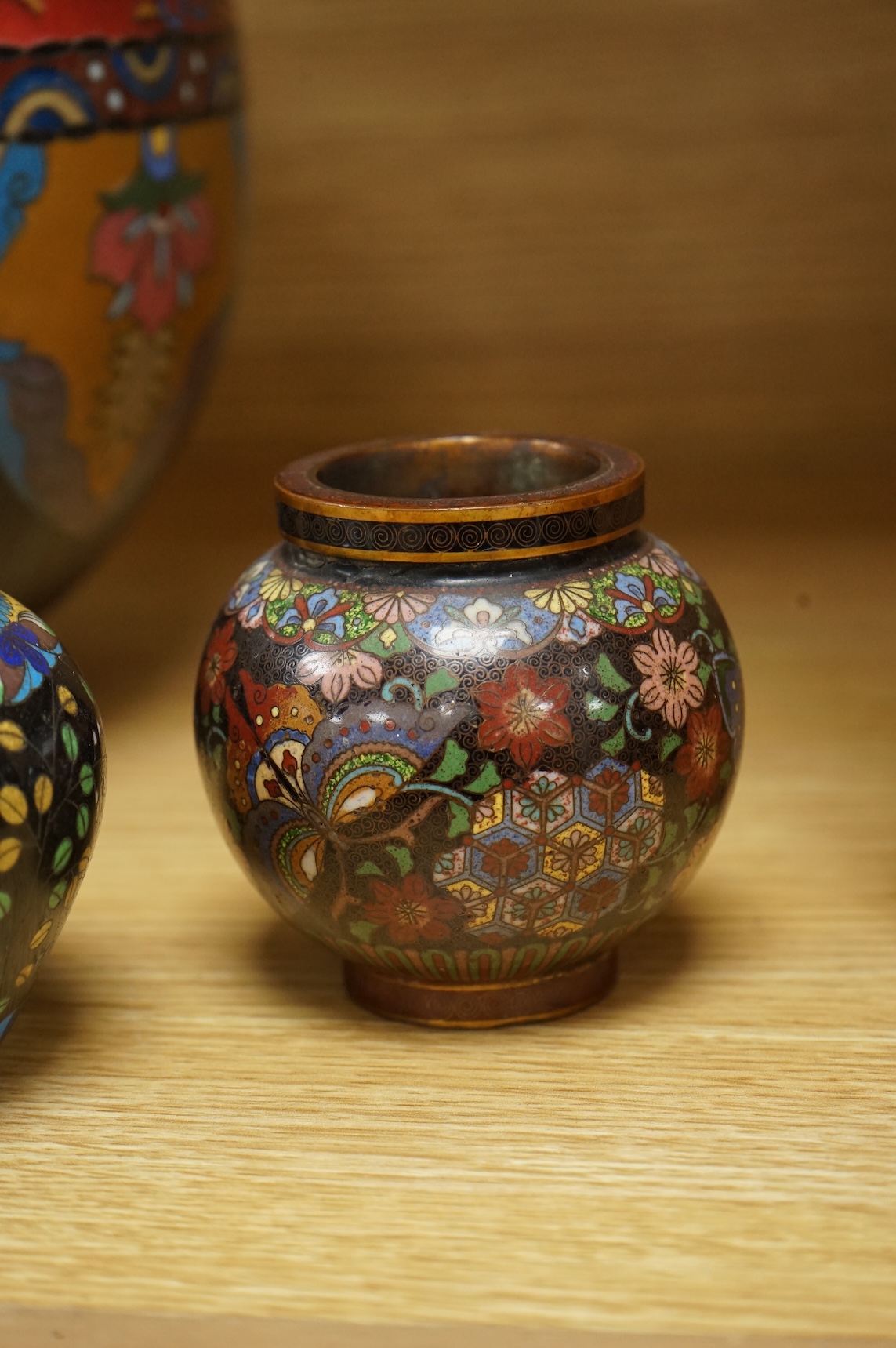 A large Japanese cloisonné enamel globular Koro and Cover, and three other pieces of cloisonné enamel, largest 211cm high